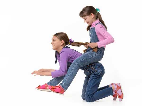 Girl Rides Another Girl Herself White Background — Stock Photo, Image