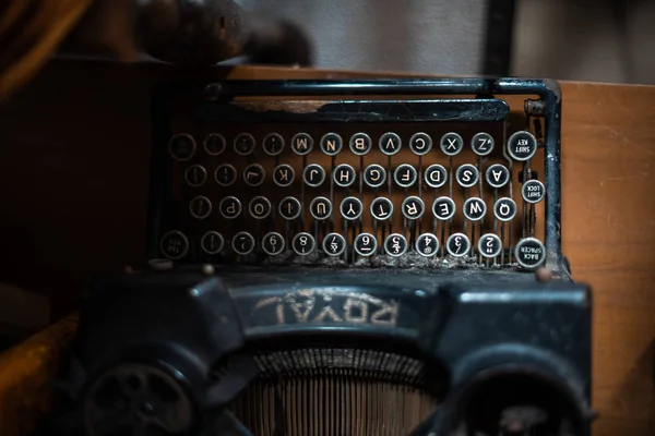 Vintage typewriter keys details close up machine retro royal uk manchester london antique shop copy space text garage rust sharp focus shallow depth of field copy space concept for writing business we — Stock Photo, Image