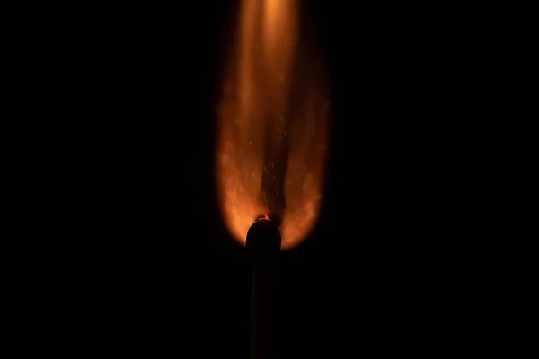 Ignition of match with sparks isolated on black background space for text fire concept passion figures variety — Stock Photo, Image