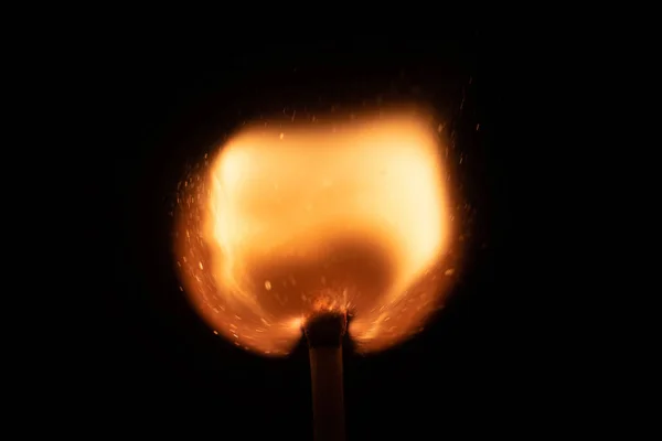 Ignition of match with sparks isolated on black background space for text fire concept passion figures variety — 스톡 사진