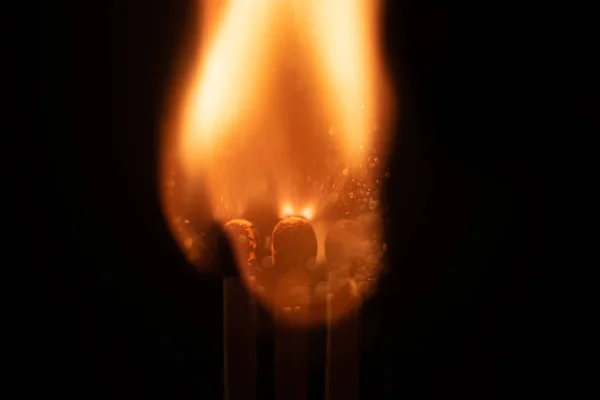 Ignition of match with sparks isolated on black background space for text fire concept passion figures variety — 스톡 사진