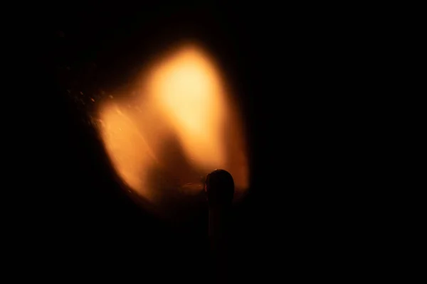 Ignition of match with sparks isolated on black background space for text fire concept passion figures variety — Stock Photo, Image