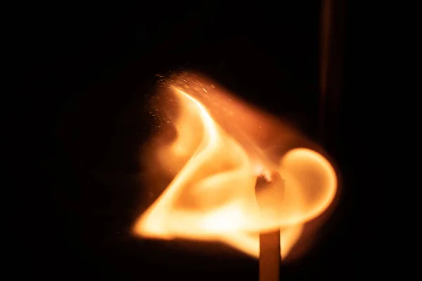 Ignition of match with sparks isolated on black background space for text fire concept passion figures variety — 스톡 사진