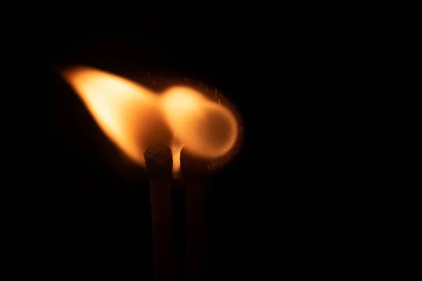 Ignition of match with sparks isolated on black background space for text fire concept passion figures variety — 스톡 사진