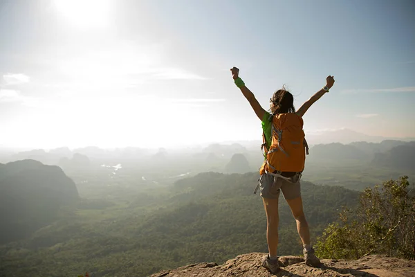 Young traveler with raised hands — Stock Photo, Image