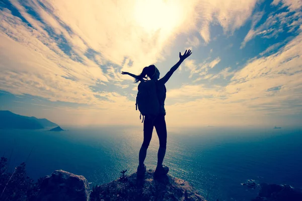 Young traveler with raised hands — Stock Photo, Image