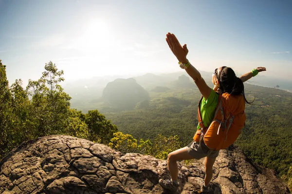 Young traveler with raised hands — Stock Photo, Image