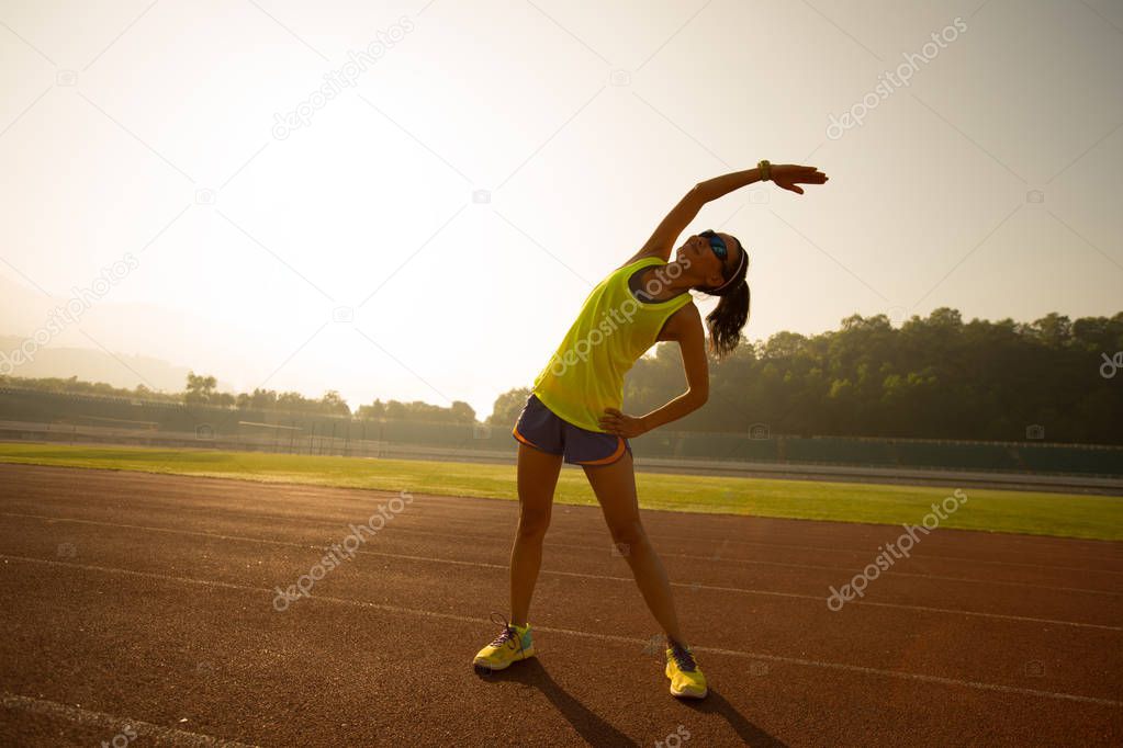 Young woman stretching 