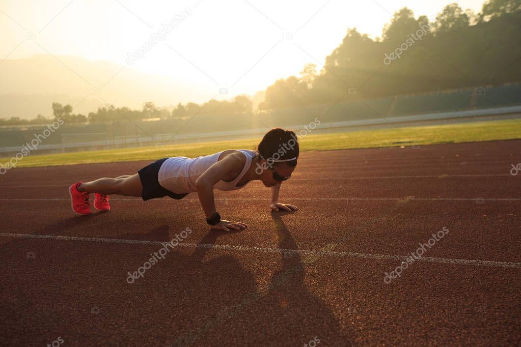 woman practicing push ups