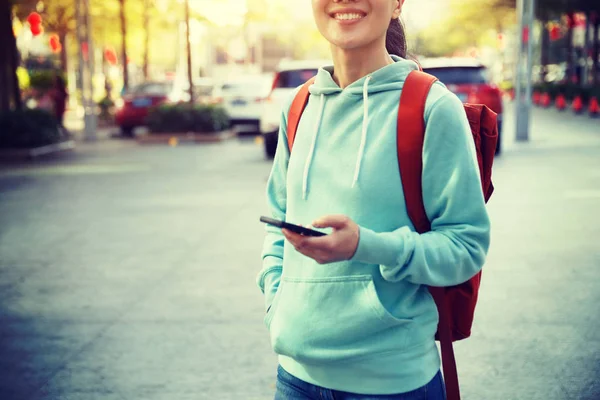 Woman with modern smartphone — Stock Photo, Image