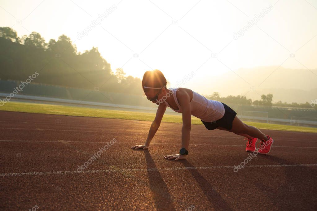 young woman doing push up