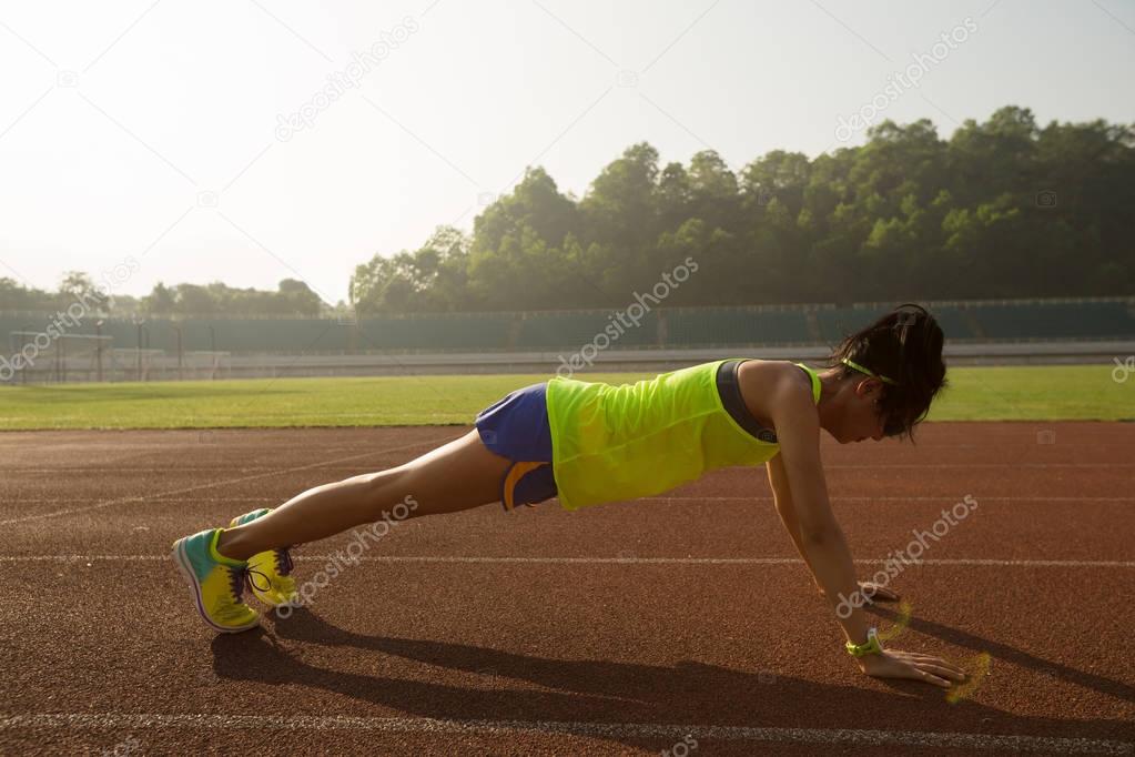 young woman doing push up