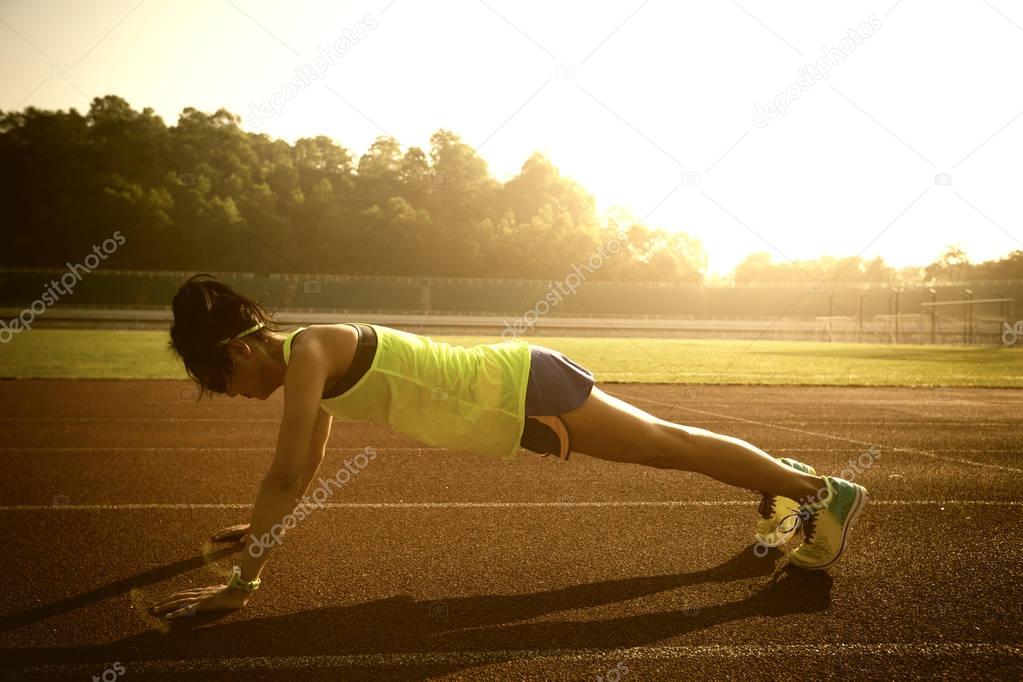 young woman doing push up