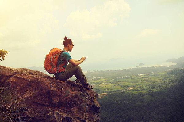 woman reading electronic book