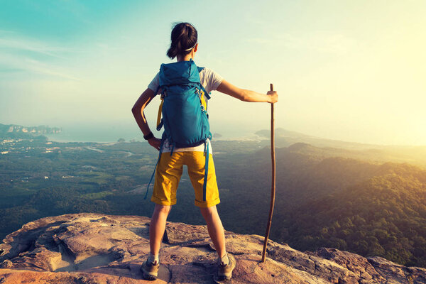 Young woman on mountain top