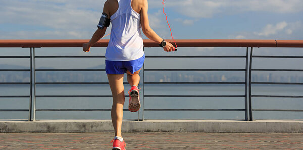young woman jumping rope