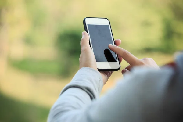 Hands using smartphone Royalty Free Stock Photos