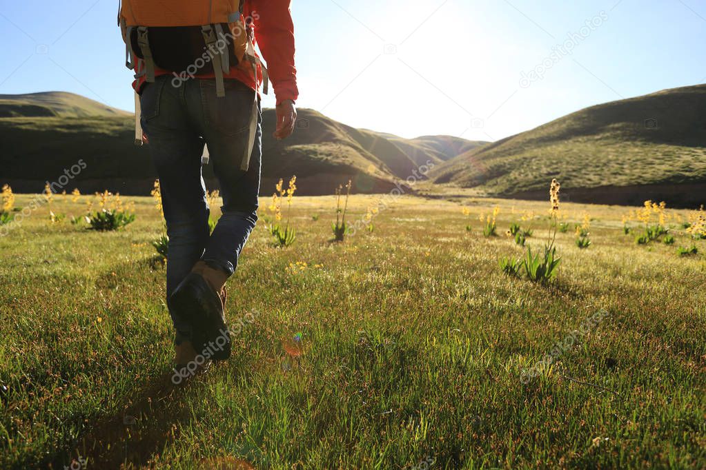 woman hiking in mountains