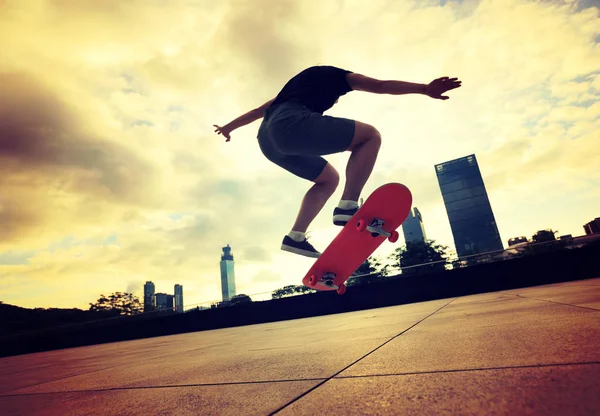 Woman practicing with skateboard