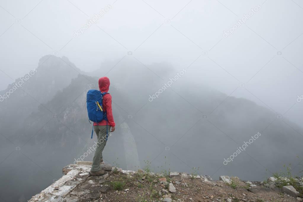 Young woman hiker enjoying view