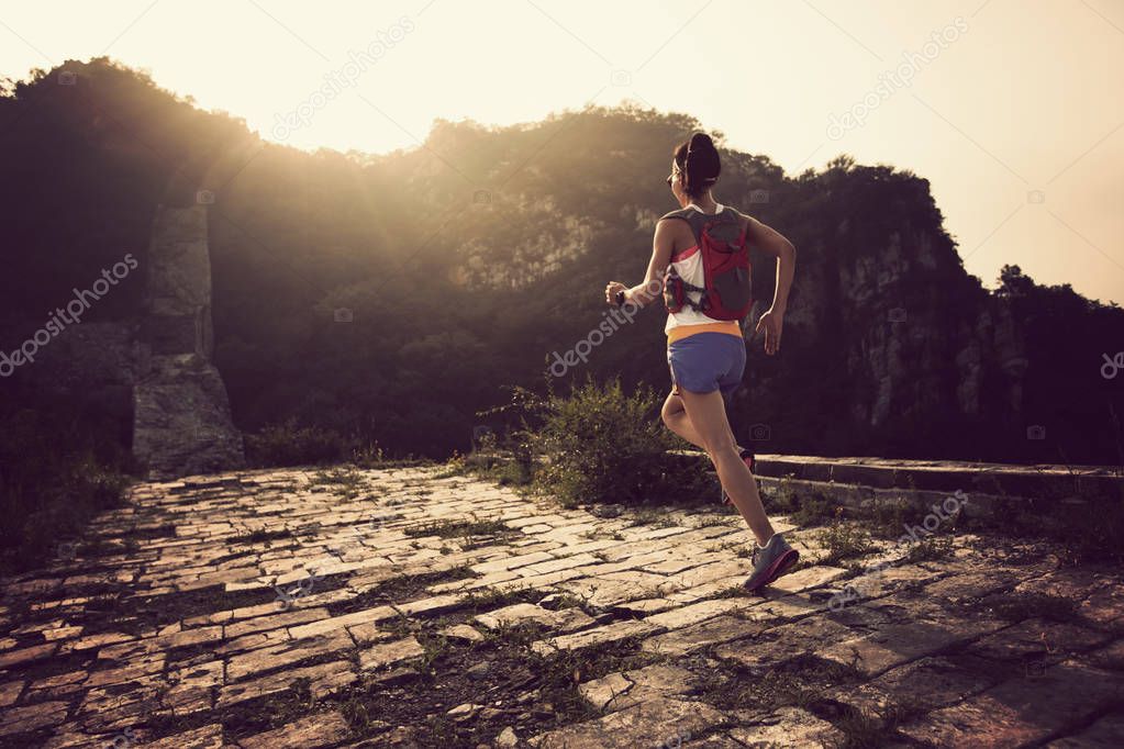  woman running on great wall