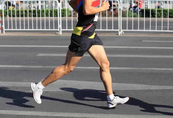 Marathon runner on road — Stock Photo, Image