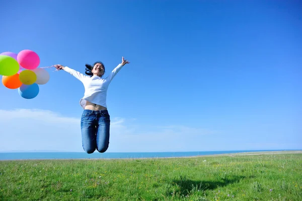 Young Asian Woman Balloons Jumping Green Meadow — Stock Photo, Image