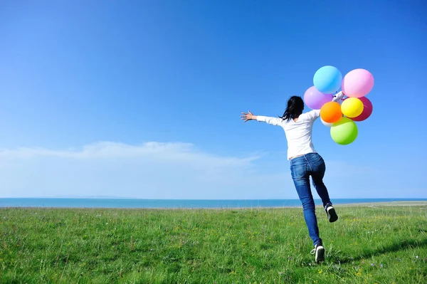 Young Asian Woman Balloons Jumping Green Meadow — Stock Photo, Image