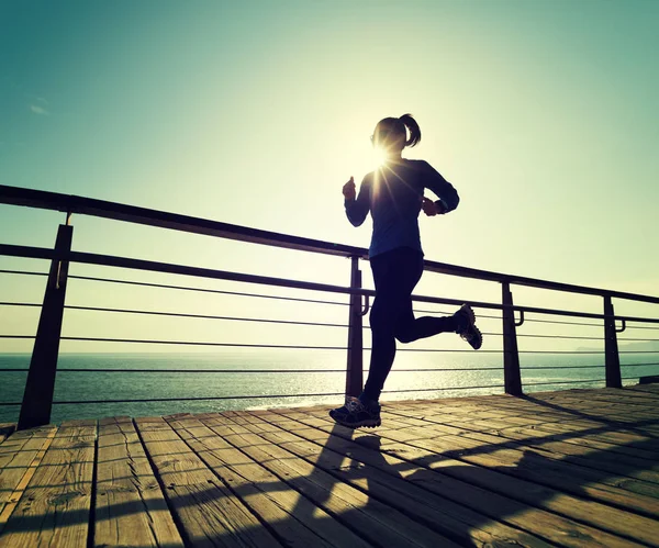 Sporty Young Woman Running Seaside Boardwalk Sunrise — Stock Photo, Image