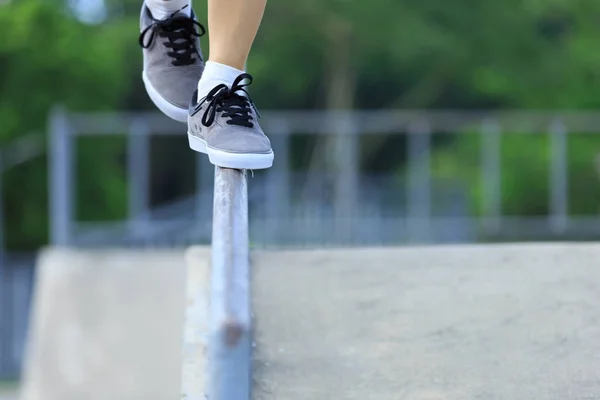 legs walking on steel pipe with balance