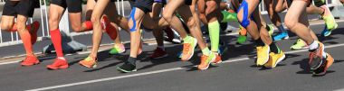 marathon runner legs running on city road clipart