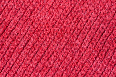 Örme kırmızı kazaklı dokusuna
