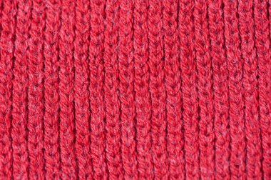 Örme kırmızı kazaklı dokusuna
