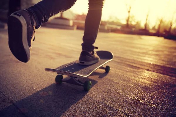 Unrecognizable Woman Skateboarding Sunset Urban Chinese City — ストック写真