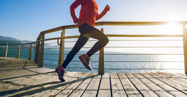 Sporty Female Jogger Exercising Seaside Boardwalk Morning Sunrise — Stock Photo, Image