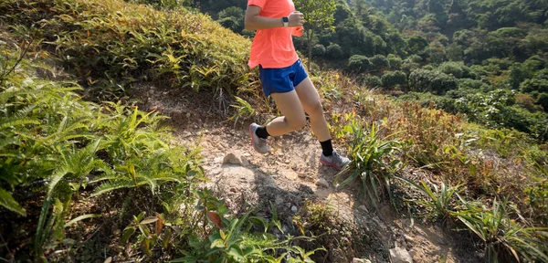 Female Trail Runner Jogging Downhill Mountain Slope Tropical Forest — 图库照片