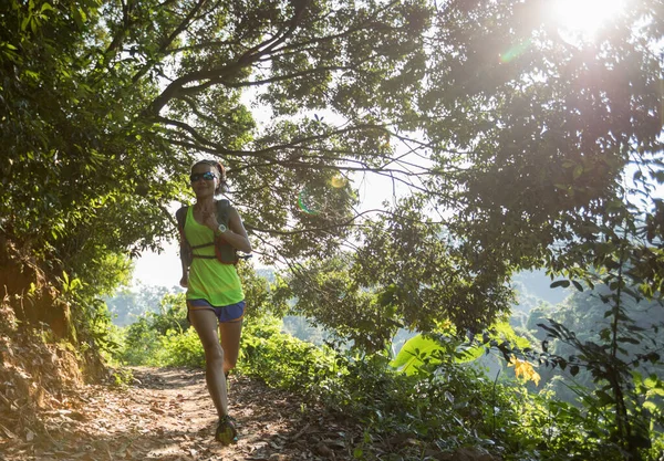 Young Female Trail Runner Running Tropical Forest Trail — Stock Photo, Image