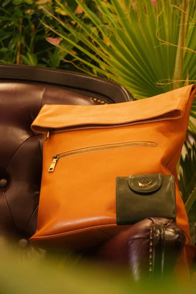 yellow patent leather bag among the colors