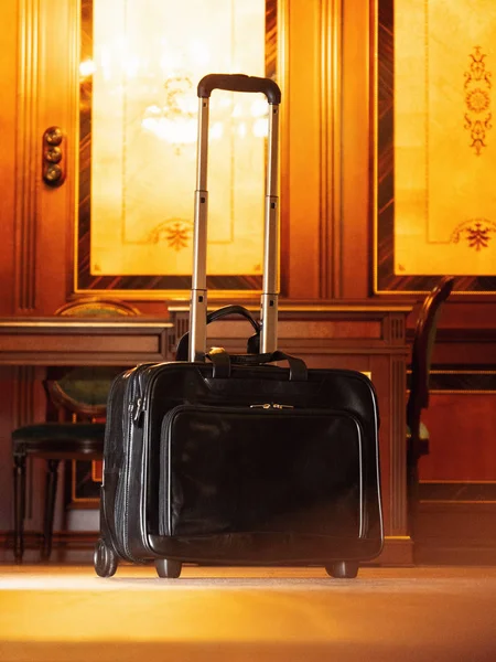 black travel leather suit case