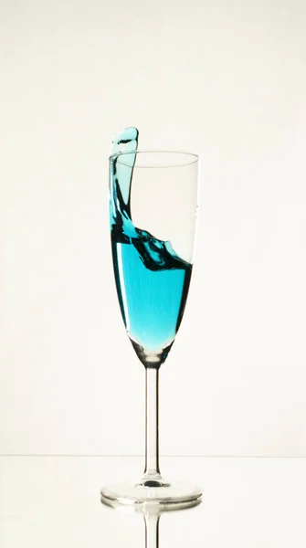 Splash of water in a wine glass — Stock Photo, Image