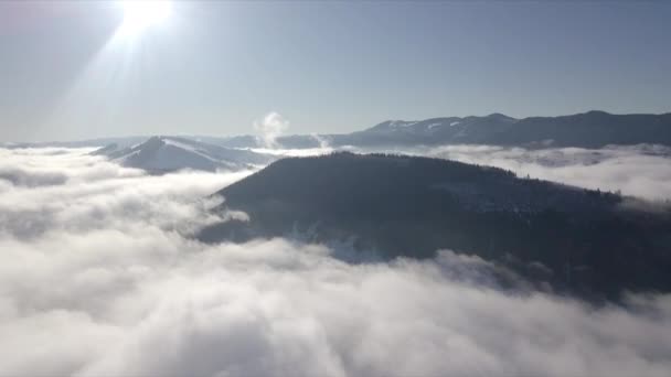 Beautiful landscape with mountain peaks covered with snow and clouds — Stock Video