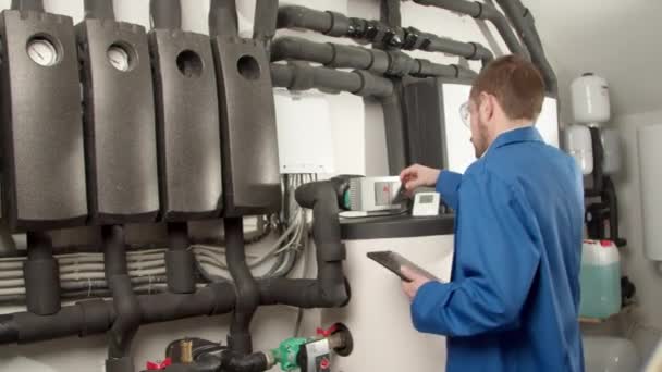 Young engineer checking new equipment — Stock Footage Young engineer checking new equipment Video Clip