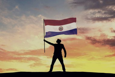 Paraguay bayrağı sallayan erkek siluet figürü. 3d Hazırlama