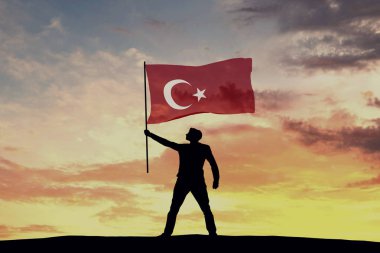 Hindi bayrağı sallayan erkek siluet figürü. 3d Hazırlama