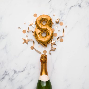 Champagne bottle with gold number 8 balloon. Minimal party anniversary concept clipart