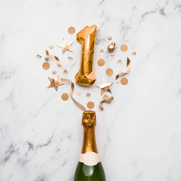 Champagne bottle with gold number 1 balloon. Minimal party anniversary concept