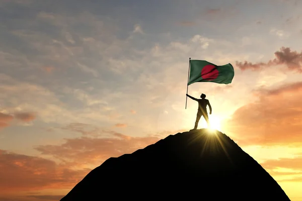 Bandeira de Bangladesh sendo acenada no topo de um cume de montanha. Renderização 3D — Fotografia de Stock