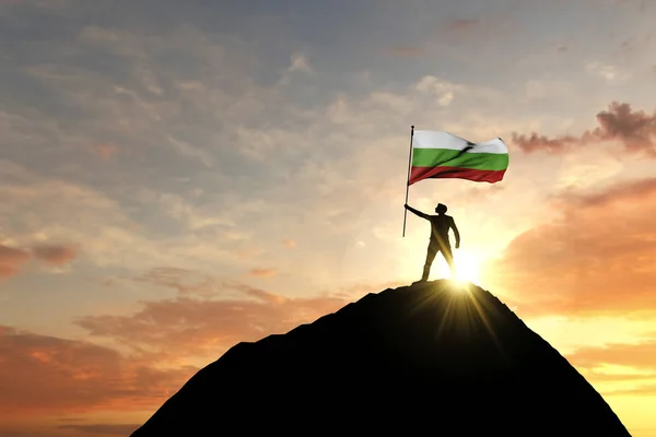 Die bulgarische Flagge wird oben auf einem Berggipfel geschwenkt. 3D-Darstellung — Stockfoto