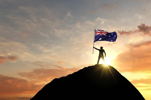 Bandeira australiana sendo acenada no topo de um cume de montanha. Renderização 3D — Fotografia de Stock