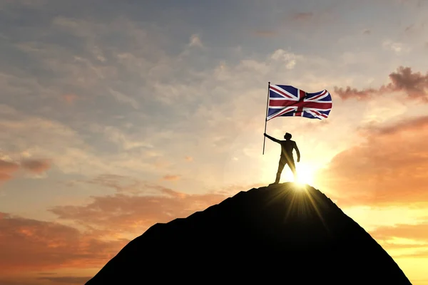 Bandera del Reino Unido ondeada en la cima de una cumbre de montaña. Renderizado 3D —  Fotos de Stock